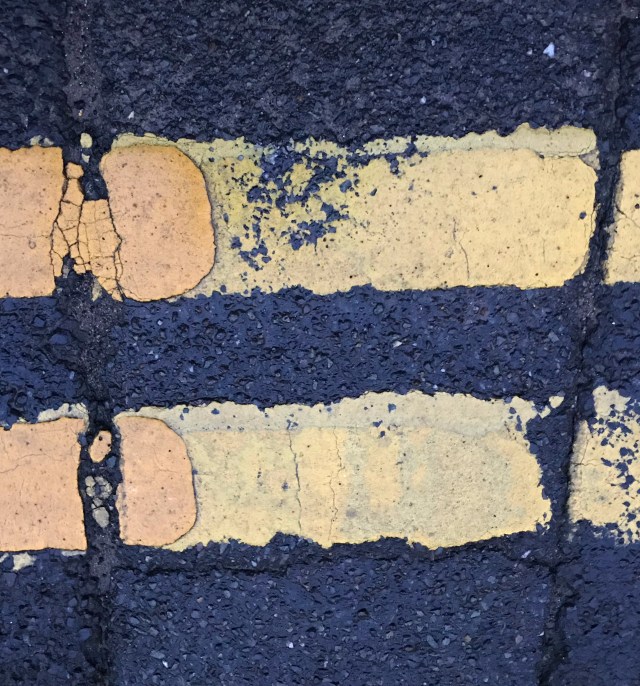 Just an image of double yellow lines looking like an equals sign